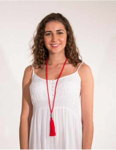 Long necklace of pearls and Buddha head