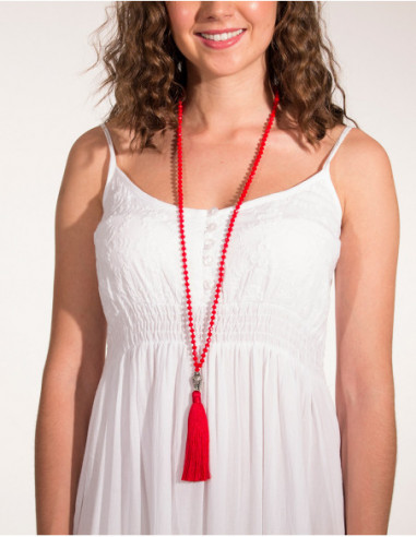 Long necklace of pearls and Buddha head