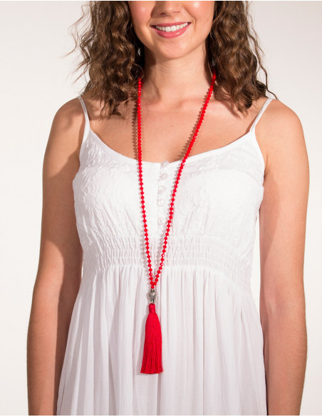 Long necklace of pearls and Buddha head