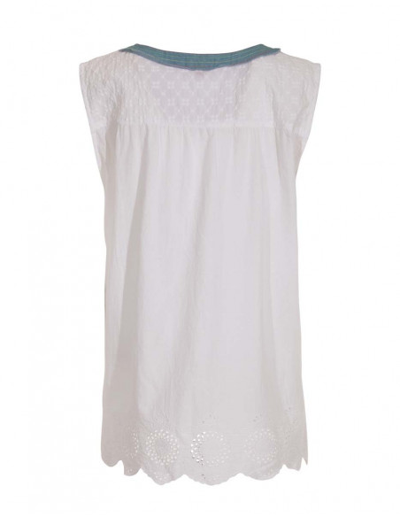 White top and English embroidered jeans