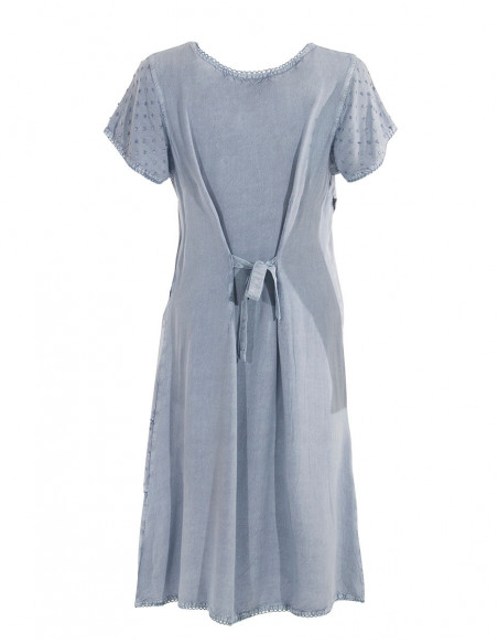 White or faded embroidered dress