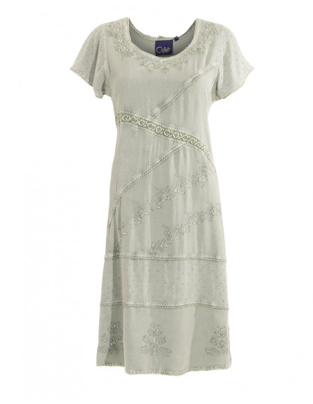 White or faded embroidered dress