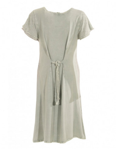 White or faded embroidered dress