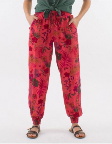 Pantalon femme léger resserré aux chevilles corail imprimé fleurs colorées estivales