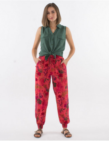 Pantalon léger élastiqués aux chevilles pour femme corail avec fleurs colorées tropicales