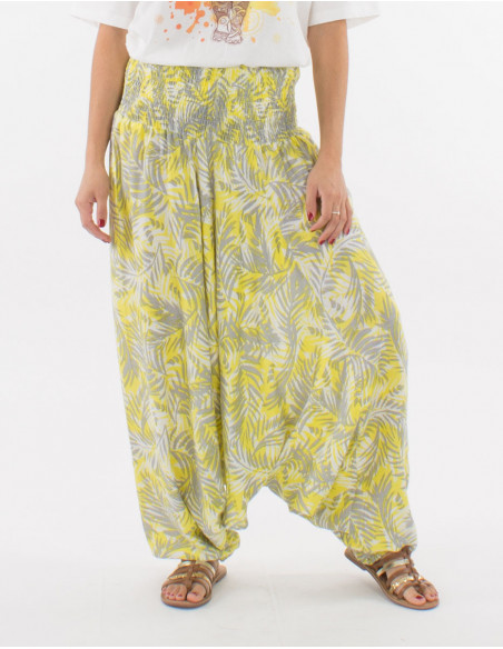 Pantalon femme sarouel fourche basse original avec motif esprit bohème de feuilles pour l'été