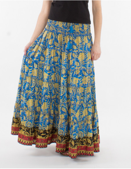 Jupe longue et robe courte modèle 2en1 pour l'été 2022 avec fines bretelles et motif original hippie de fleurs bleu pétrole