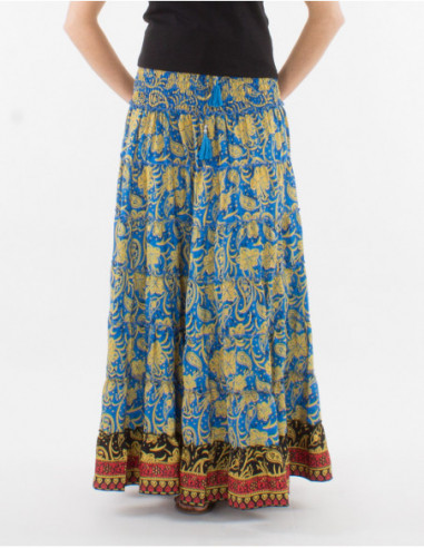 Jupe longue et robe courte modèle 2en1 pour l'été 2022 avec fines bretelles et motif original hippie de fleurs bleu pétrole