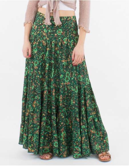Jupe longue verte coupe évasée avec large ceinture pour plus de confort et motif boho chic de fleurs scintillantes