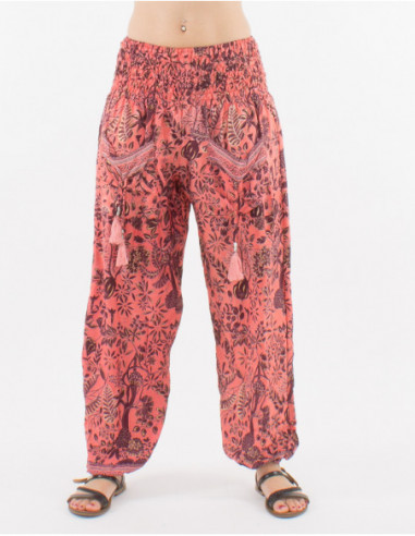 Pantalon fluide d'été pour femme avec poches sur les cuisses finis de pompons et imprimé original fleuri rose saumon