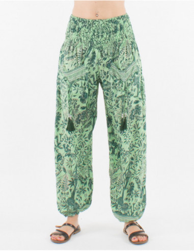 Pantalon d'été loose femme avec élastique à la taille et poches avant originales à motif fleuri hippie vert