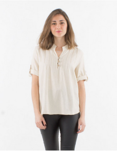 Basic tunic with short sleeves and pleats on the chest plain white