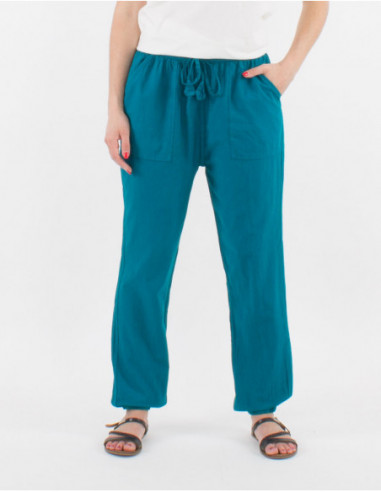Pantalon femme droit en coton uni bleu pétrole avec poches avant et élastiques à la taille