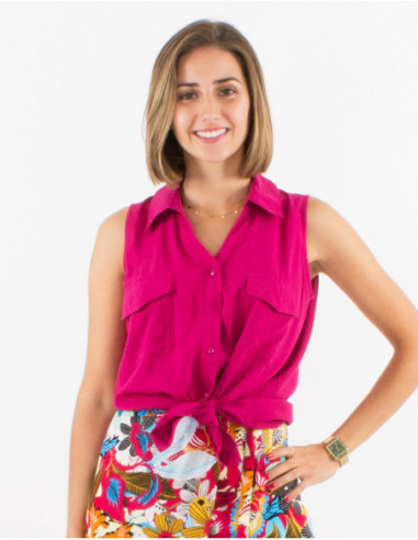 Women's solid fuchsia pink sleeveless button-down shirt with pockets