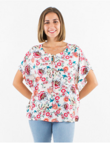 Comfortable loose-fitting blouse for spring with romantic white floral print