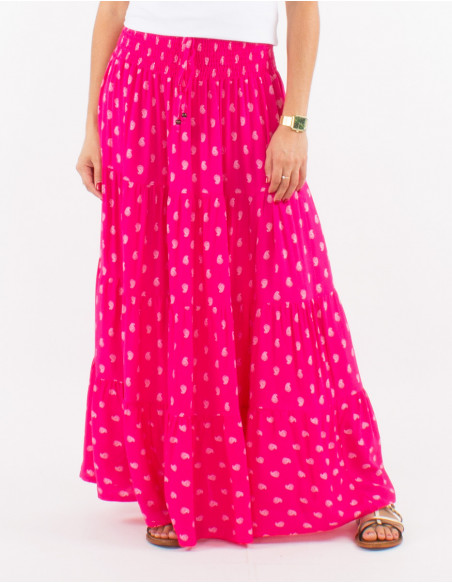 Pink long skirt with bohemian chic ruffles and small patterns