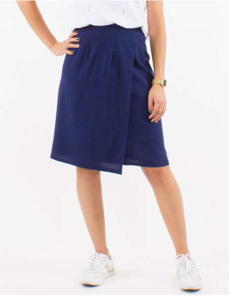 Women's cotton pants with basic pockets in ecru
Mid-length skirt for summer chic in plain navy blue linen for women