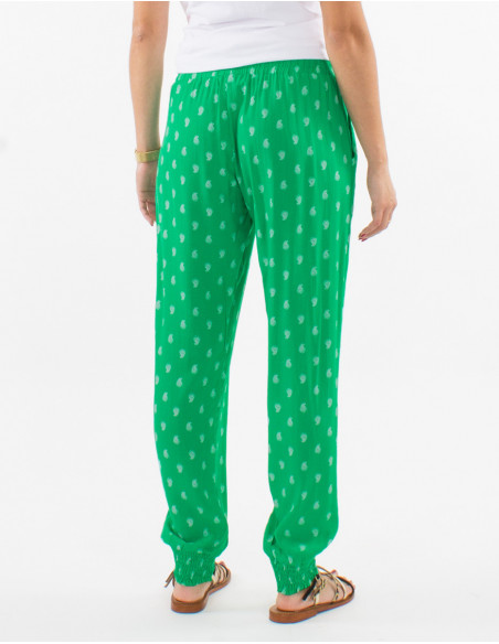 Lightweight boho chic women's summer pants in green with gold paisley print