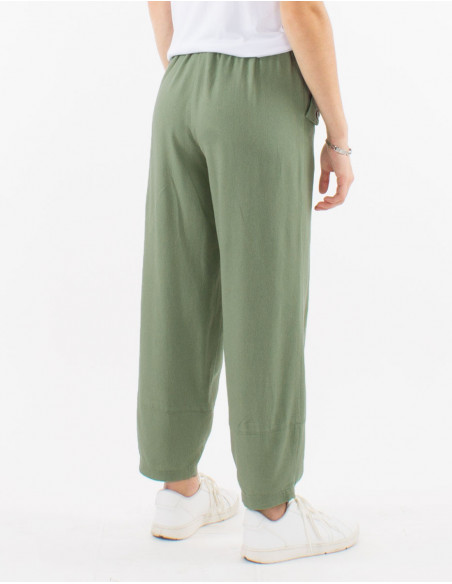 Lightweight summer cotton pants for women in a basic water green color