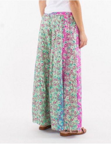 Oversized spring pants with boho chic pastel pink flowers