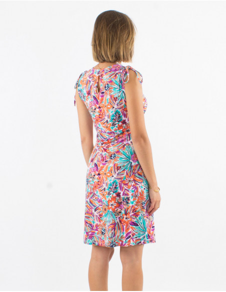 Short stretch summer dress with ties on the shoulders and white foliage print