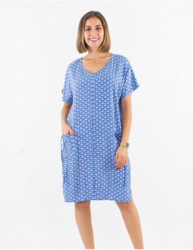 Oversized short-sleeved dress with patch pockets in original blue pattern