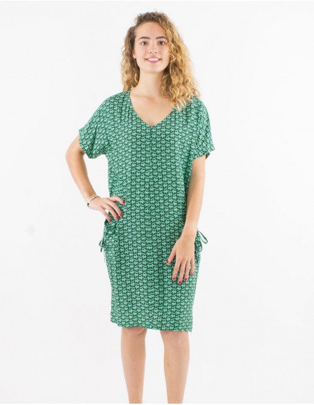 Oversized short-sleeved dress with patch pockets in original green pattern
