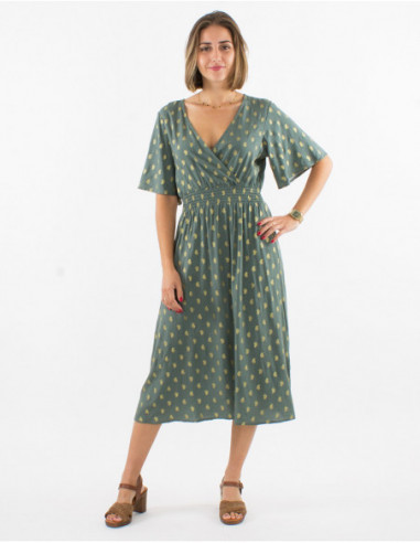 Chic golden midi dress fitted at the waist with khaki green patterns
