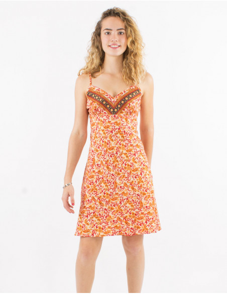 Short feminine summer dress with pastel red floral pattern