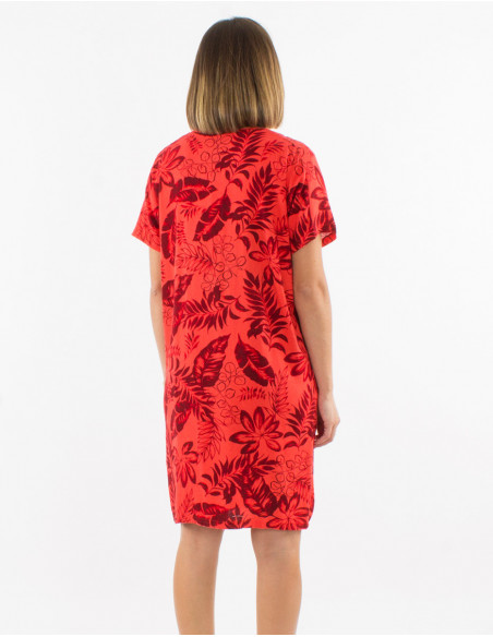 Feminine chic mid-length dress for spring with coral orange big leaves print