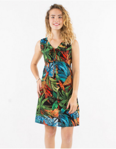Short flared dress in original baba cool cotton with black leaves