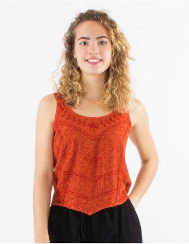 Top asymétrique uni original avec broderies orange rouille