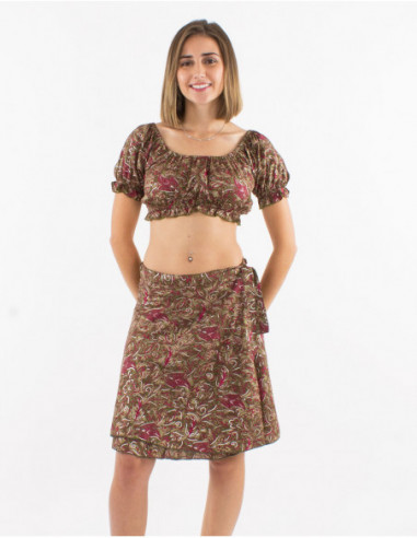 Original summer look with elastic bra and short silver skirt in brown