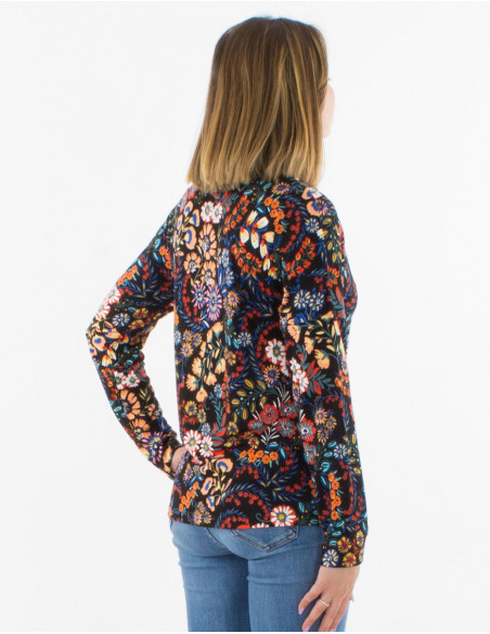 Original women's turtleneck blouse with black floral boho motif