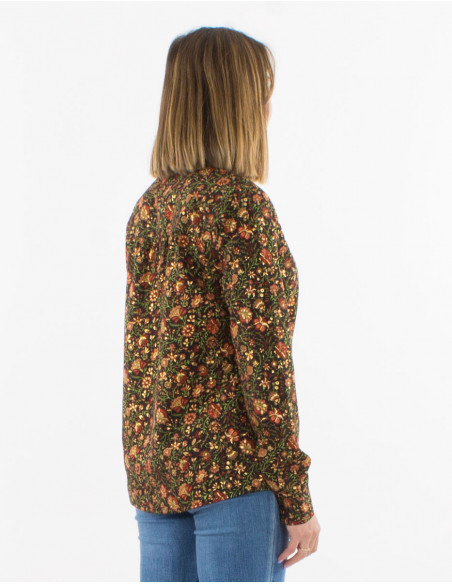 Women's flowing shirt in black floral hippie print with gold accents