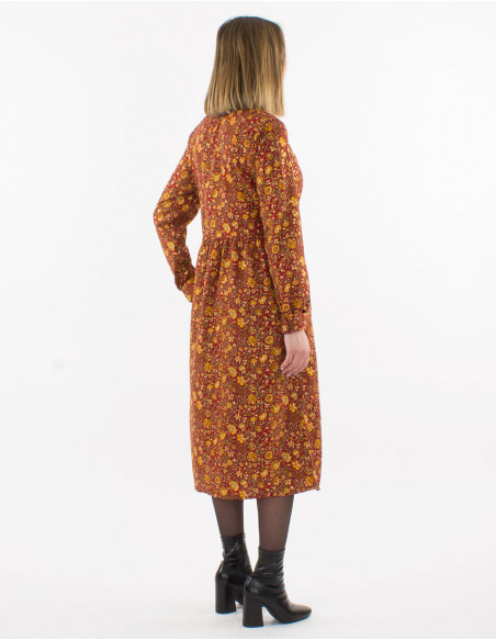 Mid-length hippie chic dress for autumn with small gold flower motif in burgundy red