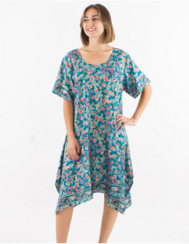 Fluid dress with golden pastel flowers