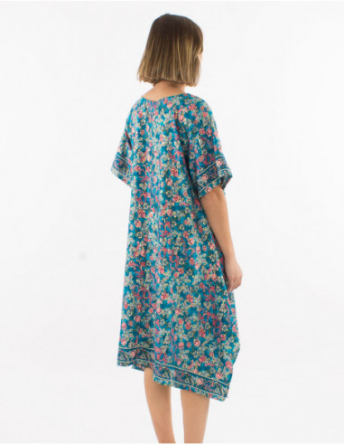 Fluid dress with golden pastel flowers