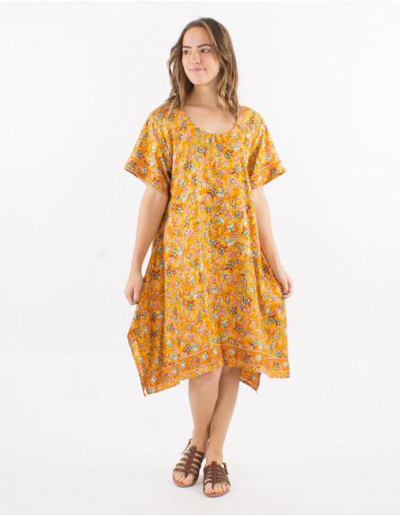 Fluid dress with golden pastel flowers