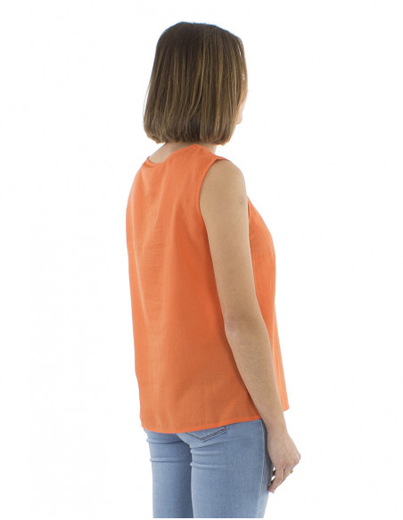 top bohème chic sans manches avec liens et pompons